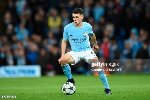 Manchester City's English midfielder Phil Foden controls the ball during the UEFA Champions League Group F football match between Manchester City and...
