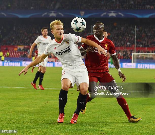 Sadio Mane of Liverpool competes with Johannes Geis of Sevilla FC during the UEFA Champions League group E match between Sevilla FC and Liverpool FC...