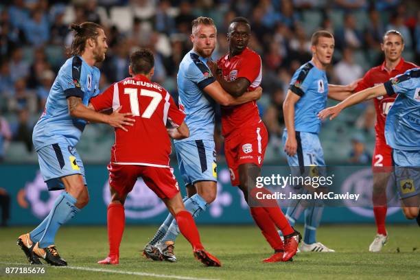 Jordy Buijs of Sydney and Baba Diawara of Adelaide compete for the ball during the FFA Cup Final match between Sydney FC and Adelaide United at...