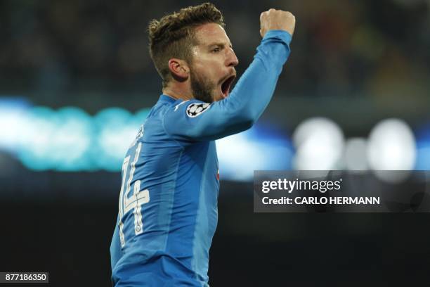 Napoli's forward from Belgium Dries Mertens celebrates after scoring during the UEFA Champions League Group F football match Napoli vs Shakhtar...