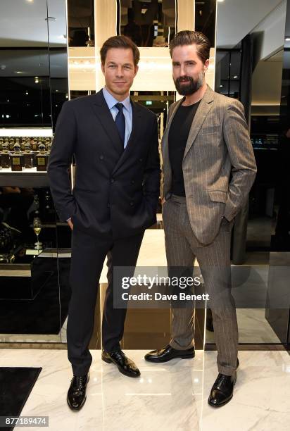 Paul Sculfor and Jack Guinness attend the men's grooming event for the opening of the first TOM FORD global beauty store in Covent Garden on November...