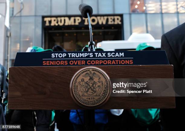 New York Mayor Bill de Blasio's podium stands in front of Trump Tower as the mayor joins other Democratic officials, labor members and activists to...