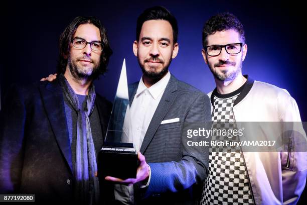 Rob Bourdon, Mike Shinoda, and Brad Delson of music group Linkin Park pose for a portrait during the 2017 American Music Awards at Microsoft Theater...