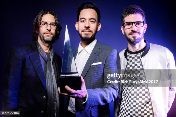 Rob Bourdon, Mike Shinoda, and Brad Delson of music group Linkin Park pose for a portrait during the 2017 American Music Awards at Microsoft Theater...