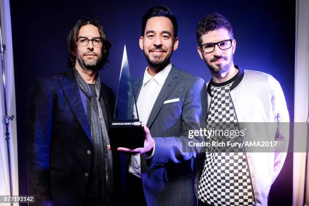 Rob Bourdon, Mike Shinoda, and Brad Delson of music group Linkin Park pose for a portrait during the 2017 American Music Awards at Microsoft Theater...