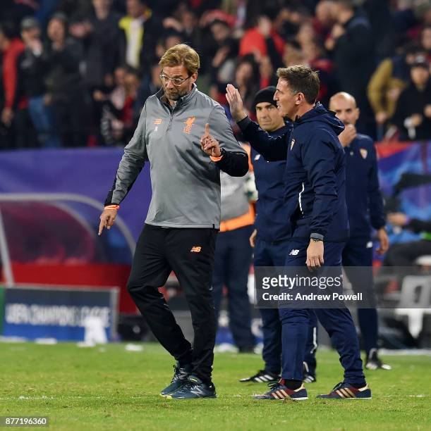 Jurgen Klopp manager of Liverpool with Eduardo Berizzo manager of Sevilla FC at the end of the UEFA Champions League group E match between Sevilla FC...