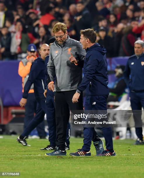 Jurgen Klopp manager of Liverpool with Eduardo Berizzo manager of Sevilla FC at the end of the UEFA Champions League group E match between Sevilla FC...