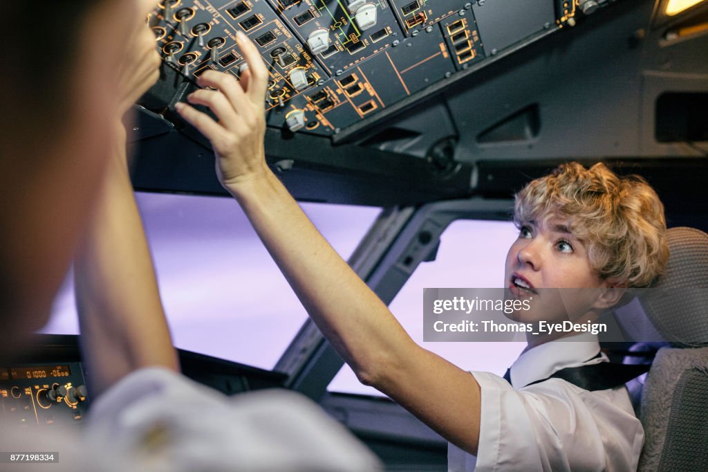 Trainee Photo Trainee Pilot Following Directions From Flight Instructor During ...