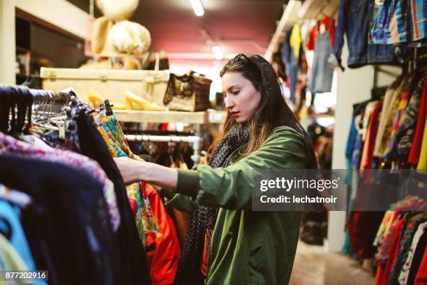 woman shopping in london second hand marketplace - second hand stock pictures, royalty-free photos & images