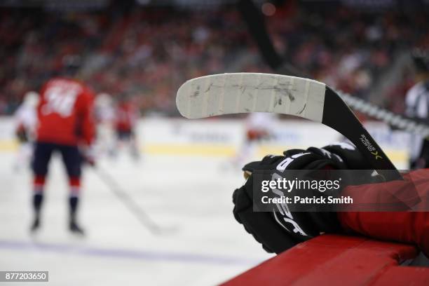 General view of Bauer hockey gloves and a hockey stick as the Calgary Flames play the Washington Capitals at Capital One Arena on November 20, 2017...