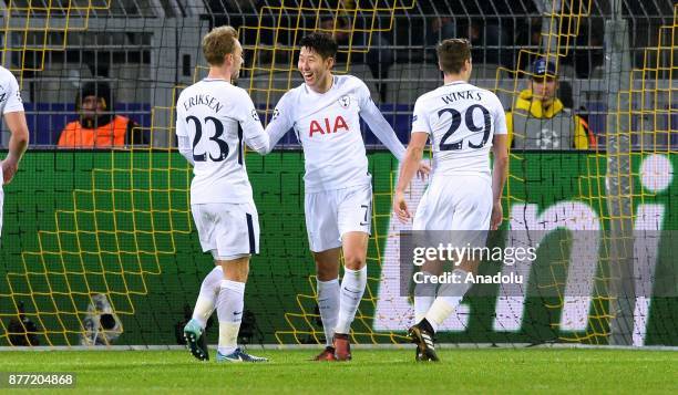 Heung-Min Son of Tottenham Hotspur FC celebrates with his teammates after scoring a goal during the UEFA Champions League Group H soccer match...