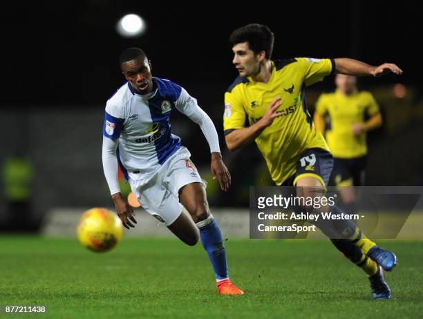 Oxford United's Xemi Fernandez holds off the challenge from Blackburn Rovers' Rekeem Harper during the Sky Bet League One match between Oxford United...
