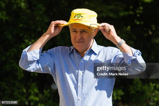 Australian Prime Minister Malcom Turnbull wears an Australian cricket hat during an Australian Women's cricket team meet and greet with the...