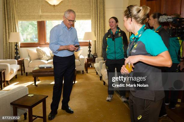 Australian Prime Minister Malcom Turnbull shows Southern Stars players around the Lodge during an Australian Women's cricket team meet and greet with...