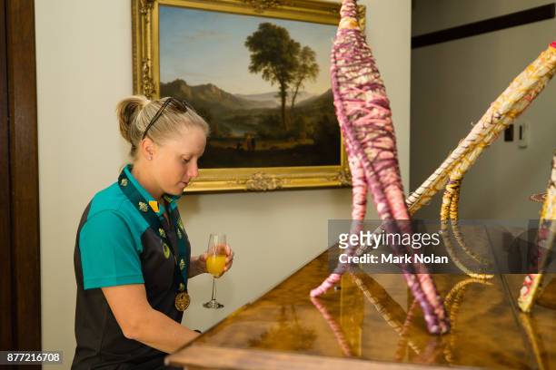 Alyssa Healy of the Southern Stars plays the piano during an Australian Women's cricket team meet and greet with the Australian Prime Minister...