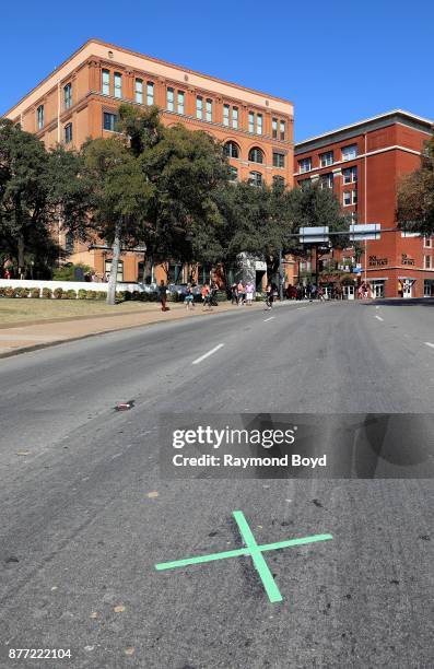 Marks the spot along Elm Street, which is the site where President John F. Kennedy was assassinated on November 22, 1963 in Dallas, Texas on November...