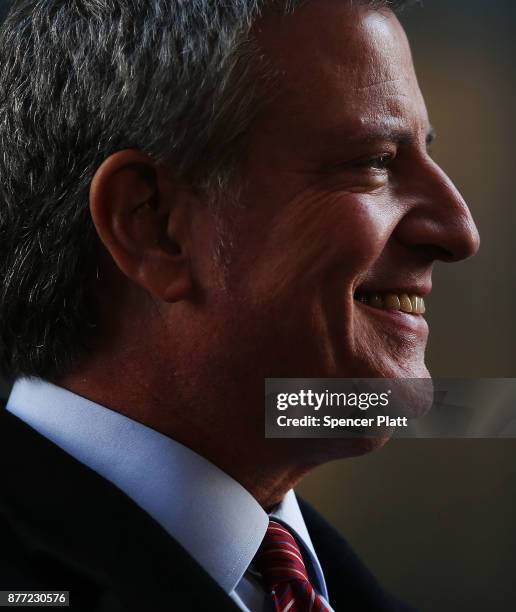 New York Mayor Bill de Blasio joins other Democratic officials, labor members and activists in front of Trump Tower to protest against the proposed...