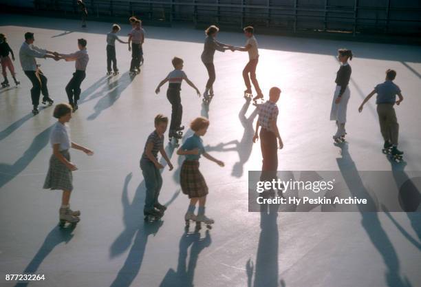 General view of people roller skating circa November, 1954 at the Westchester SkateLand in Westchester, New York.