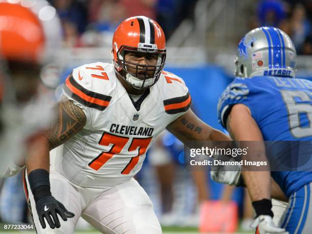 Right tackle Zach Banner of the Cleveland Browns prepares to engage defensive end Anthony Zettel of the Detroit Lions in the third quarter of a game...