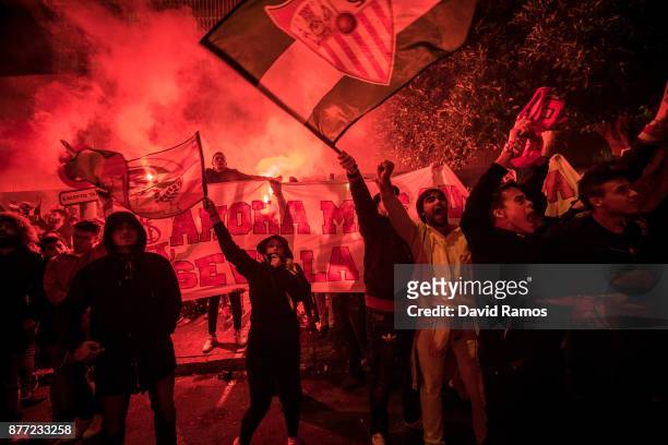 Fans of Sevilla FC make their way to the stadium prior to the UEFA Champions League group E match between Sevilla FC and Liverpool FC at Estadio...