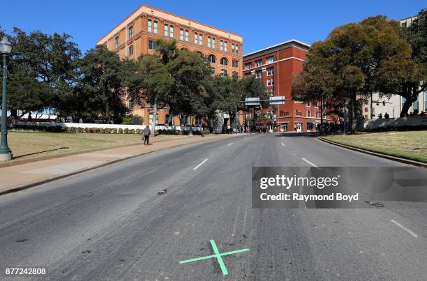 Marks the spot along Elm Street, which is the site where President John F. Kennedy was assassinated on November 22, 1963 in Dallas, Texas on November...