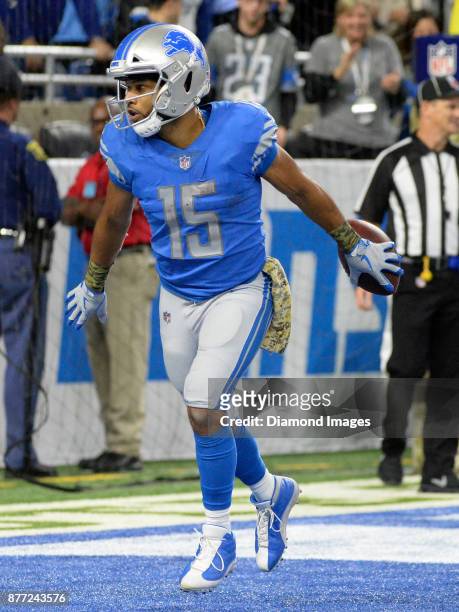Wide receiver Golden Tate of the Detroit Lions celebrates after scoring on a touchdown pass in the fourth quarter of a game on November 12, 2017...