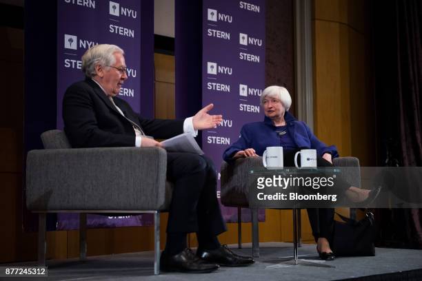 Mervyn King, former governor of the Bank of England, left, speaks as Janet Yellen, chair of the U.S. Federal Reserve, listens during an event at the...