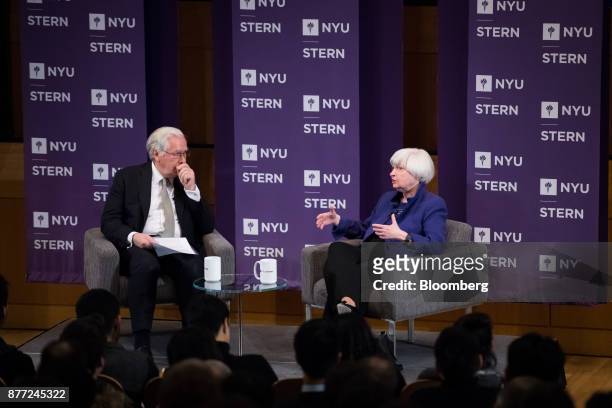 Janet Yellen, chair of the U.S. Federal Reserve, right, speaks as Mervyn King, former governor of the Bank of England, listens during an event at the...