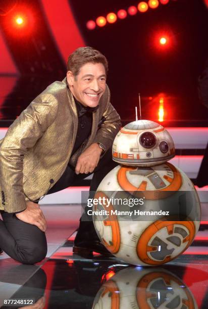 Johnny Lozada and BB-8 at Mira Quien Baila Finals at Univision Studios on November 19, 2017 in Miami, FL