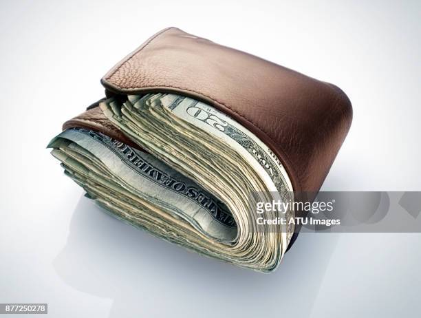 fat wallet money - wallet stock pictures, royalty-free photos & images