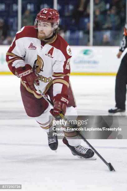 Adam Holwell of the Acadie-Bathurst Titan skates with the puck against the Gatineau Olympiques on October 18, 2017 at Robert Guertin Arena in...