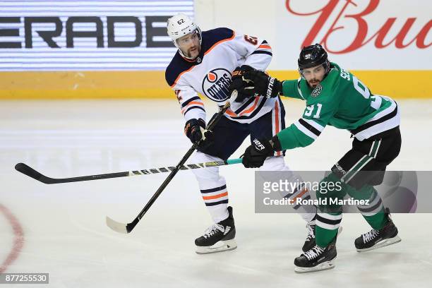 Eric Gryba of the Edmonton Oilers and Tyler Seguin of the Dallas Stars in the third period at American Airlines Center on November 18, 2017 in...