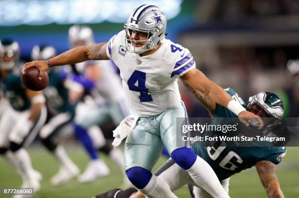 Dallas Cowboys quarterback Dak Prescott is sacked by Philadelphia Eagles defensive end Derek Barnett on November 19 at AT&T Stadium in Arlington,...