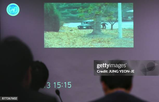 Surveillance TV footage containing the moment of defection of a North Korean Soldier, is seen during a press briefing by the United Nations Command...