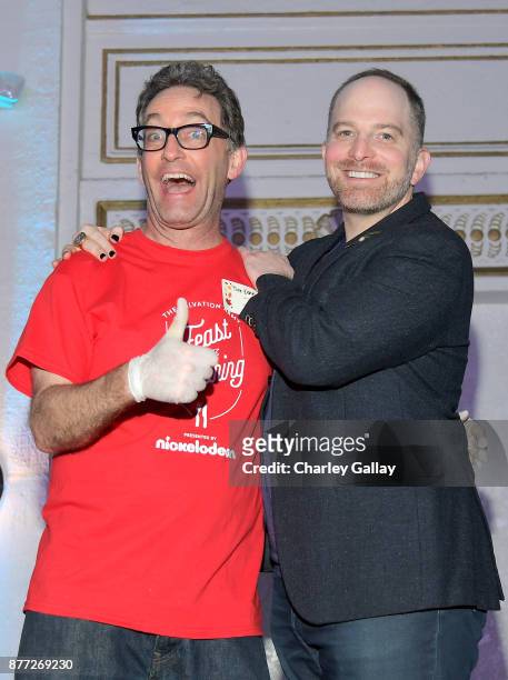 Actor Tom Kenny and Nickelodeon Senior Manager of Public Affairs David Bruson attend The Salvation Army Feast of Sharing presented by Nickelodeon at...