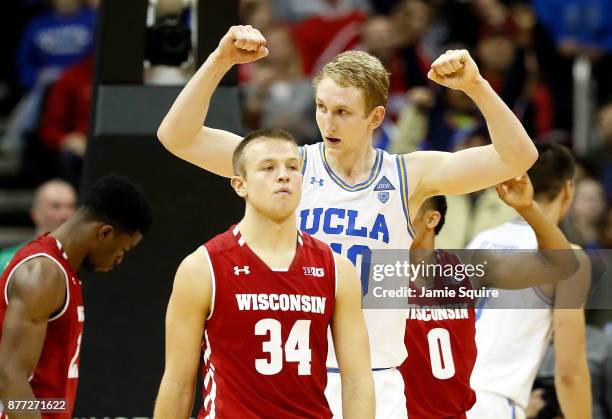 Thomas Welsh of the UCLA Bruins celebrates after Aaron Holiday of the UCLA Bruins made a three-pointer at the end of the National Collegiate...