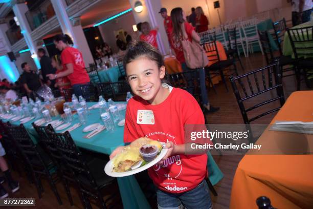 Volunteer serves food during The Salvation Army Feast of Sharing presented by Nickelodeon at Casa Vertigo on November 21, 2017 in Los Angeles,...