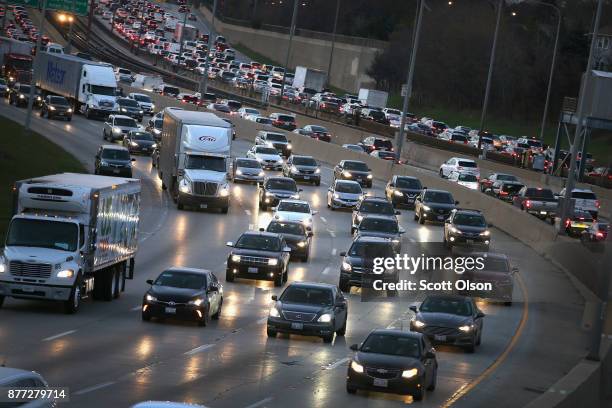 The Kennedy Expressway is clogged with cars as rush-hour commuters and Thanksgiving holiday travelers try to make their way through the city on...