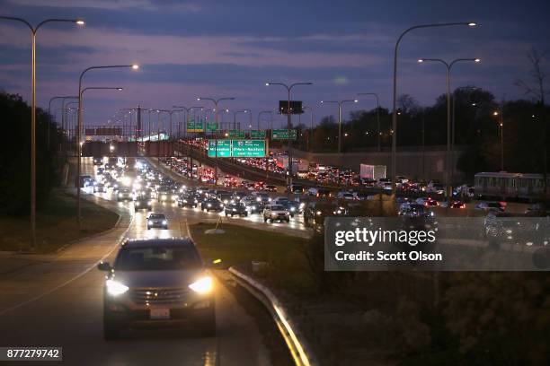 The Kennedy Expressway is clogged with cars as rush-hour commuters and Thanksgiving holiday travelers try to make their way through the city on...