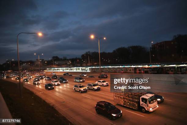 The Kennedy Expressway is clogged with cars as rush-hour commuters and Thanksgiving holiday travelers try to make their way through the city on...
