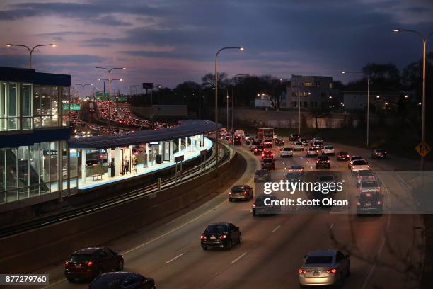 The Kennedy Expressway is clogged with cars as rush-hour commuters and Thanksgiving holiday travelers try to make their way through the city on...