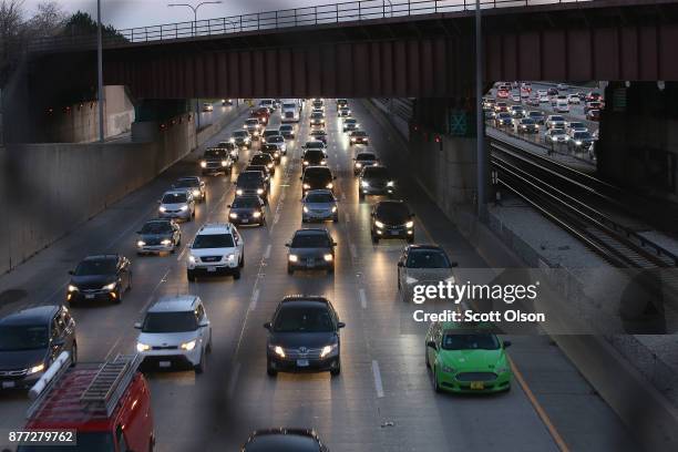 The Kennedy Expressway is clogged with cars as rush-hour commuters and Thanksgiving holiday travelers try to make their way through the city on...