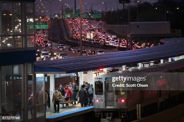 The Kennedy Expressway is clogged with cars as rush-hour commuters and Thanksgiving holiday travelers try to make their way through the city on...