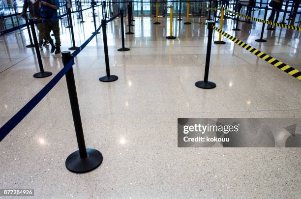 partition poles in the airport. - flight attendant cart stock pictures, royalty-free photos & images