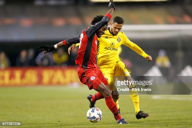 Tosaint Ricketts of the Toronto FC and Artur of the Columbus Crew SC battle for control of the ball during the second half at MAPFRE Stadium on...