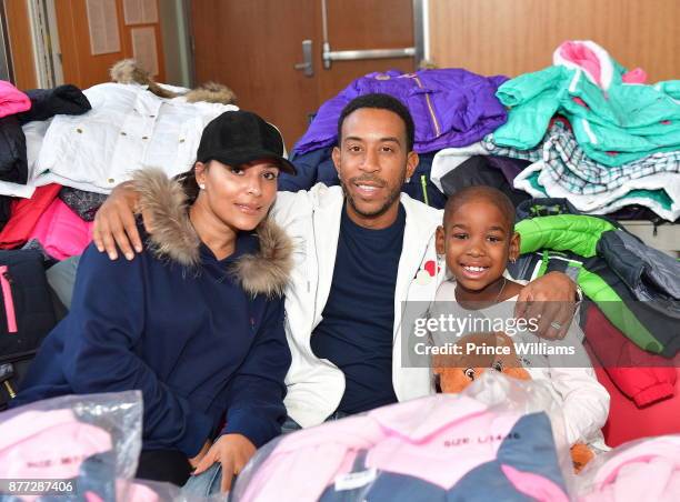 Eudoxie Bridges and Ludacris attend 2017 Ludacris Foundation Coat Giveaway at Egleston Children's Center on November 21, 2017 in Atlanta, Georgia.