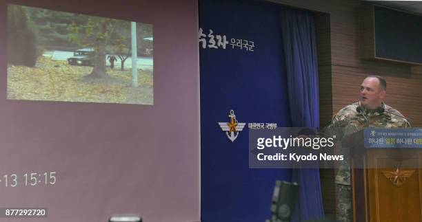 Video footage of a North Korean soldier crossing the Military Demarcation Line dividing the two Koreas in pursuit of a defector on Nov. 22 is shown...