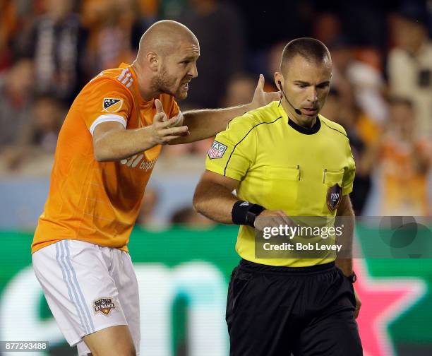 Philippe Senderos of Houston Dynamo argues with referee Chris Penso after a red card penalty was calleds on Jalil Anibaba in the first half at BBVA...