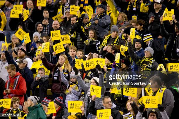 Fans hold up #SaveTheCrew signs during the first leg of the Eastern Conference Finals between the Columbus Crew SC and the Toronto FC at MAPFRE...