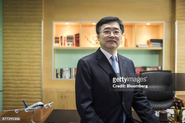 Tan Wangeng, president of China Southern Airlines Co., poses for a photo after a Bloomberg Television interview in Guangzhou, China, on Thursday,...